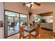 Dining room with a glass table set and sliding glass doors to the patio at 6226 Wynfield Court, Orlando, FL 32819