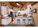 Stylish kitchen features white cabinets, a breakfast bar, and stainless steel appliances at 6226 Wynfield Court, Orlando, FL 32819
