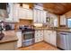Spacious kitchen featuring granite countertops, stainless steel appliances, and a modern design at 6226 Wynfield Court, Orlando, FL 32819