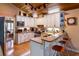 Well-lit kitchen features granite counters, stainless steel appliances, and counter seating at 6226 Wynfield Court, Orlando, FL 32819