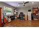Spacious office featuring hardwood floors, a large window and a ceiling fan at 6226 Wynfield Court, Orlando, FL 32819