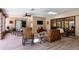 Well decorated patio with comfortable wicker furniture, ceiling fans and a skylight at 6226 Wynfield Court, Orlando, FL 32819
