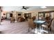 A spacious patio that is screened in and has multiple ceiling fans and skylights at 6226 Wynfield Court, Orlando, FL 32819