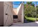 Private screened in pool area featuring an outdoor shower and well-maintained landscaping at 6226 Wynfield Court, Orlando, FL 32819