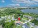 Aerial view featuring a home in a lakeside community, highlighted by a location pin at 6630 Hidden Beach Cir, Orlando, FL 32819