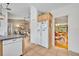 Open kitchen space with modern appliances, tile flooring, and easy access to the dining and living areas at 6630 Hidden Beach Cir, Orlando, FL 32819