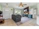 Inviting living room featuring a fireplace and large windows at 705 Ibis Ave, Deltona, FL 32738