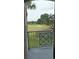 Balcony view overlooking a golf course, bringing the outdoors in, with lovely landscaping and beautiful views at 7230 Westpointe Blvd # 1235, Orlando, FL 32835