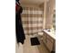 Well-lit bathroom with double sink and shower at 7230 Westpointe Blvd # 1235, Orlando, FL 32835