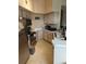 Efficient kitchen with modern appliances and ample counter space at 7230 Westpointe Blvd # 1235, Orlando, FL 32835