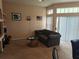 Inviting living room with a comfortable couch and natural lighting at 7230 Westpointe Blvd # 1235, Orlando, FL 32835