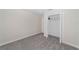 This bedroom features neutral walls, carpeting, and a closet at 7530 Summerlake Groves St, Winter Garden, FL 34787