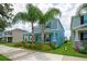 Attractive two-story home with a well-kept lawn, mature trees, and a neatly trimmed landscape at 7530 Summerlake Groves St, Winter Garden, FL 34787