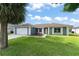 Charming single-story home with well-maintained landscaping and an attached two-car garage at 7764 Indian Ridge N Trl, Kissimmee, FL 34747
