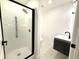 A fully renovated bathroom featuring new fixtures, and new tiling at 817 Clay Blvd, Eustis, FL 32726