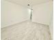 Spacious bedroom featuring new floors and paint, with ample natural light at 817 Clay Blvd, Eustis, FL 32726