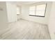 This bedroom has new flooring and paint, as well as a large closet at 817 Clay Blvd, Eustis, FL 32726