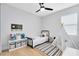 Cozy bedroom with a comfortable bed, decorative tent, and ample natural light from the window at 8290 Nemours Pkwy, Orlando, FL 32827