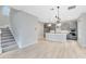 Open-concept kitchen with modern appliances and a large island, perfect for Gathering gatherings at 8290 Nemours Pkwy, Orlando, FL 32827