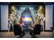 Fun game room featuring Star Wars-themed wall art, gaming chairs, and a large screen for an immersive experience at 9071 Sunshine Ridge Loop, Kissimmee, FL 34747