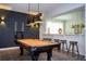 Game room featuring a pool table, accent lighting, and a bar area with stools at 9071 Sunshine Ridge Loop, Kissimmee, FL 34747