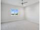 Bright bedroom features a large window providing plenty of natural light at 9156 Sheen Sound St, Orlando, FL 32836