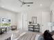 Spacious main bedroom with sitting area, side table, and comfortable decor at 9156 Sheen Sound St, Orlando, FL 32836