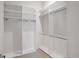 Spacious walk-in closet with custom shelving and ample storage space at 9156 Sheen Sound St, Orlando, FL 32836