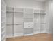 Spacious walk-in closet with custom shelving and ample storage at 9156 Sheen Sound St, Orlando, FL 32836