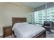 Comfortable bedroom with natural light and dedicated work space at 101 S Eola Dr # 1021, Orlando, FL 32801