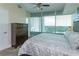 Spacious bedroom featuring a grand window with natural lighting and neutral decor at 101 S Eola Dr # 1021, Orlando, FL 32801