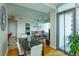 Open concept living and dining space featuring floor-to-ceiling windows with city views at 101 S Eola Dr # 1021, Orlando, FL 32801