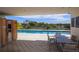 Relaxing pool area with covered seating, lush greenery, and a serene, private atmosphere at 101 S Eola Dr # 1021, Orlando, FL 32801