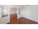 Open-concept living area with archways, wood floors, and natural light at 10142 Serotina Ct, Orlando, FL 32832
