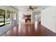 Open-concept living room flows into kitchen and screened-in porch at 10142 Serotina Ct, Orlando, FL 32832