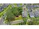 Aerial view showcasing a beautiful home with a private pool and lush landscaping nestled in a community at 102 Hammock Preserve Loop, Winter Garden, FL 34787