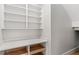 Walk-in storage with shelves and cabinets to maximize space and storage at 102 Hammock Preserve Loop, Winter Garden, FL 34787