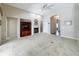 Spacious living room features a fireplace, built-in entertainment center, and neutral carpet at 106 Winghurst Blvd, Orlando, FL 32828