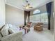 Living Room with neutral carpet, large window, and cozy seating area at 106 Winghurst Blvd, Orlando, FL 32828