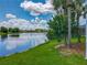 Scenic view of the pond and the lush greenery at 106 Winghurst Blvd, Orlando, FL 32828