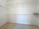 Walk-in closet featuring wire shelving and carpet flooring for storage at 106 Winghurst Blvd, Orlando, FL 32828