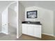 Upstairs wet bar with modern cabinetry, sink, and plenty of countertop space at 106 Winghurst Blvd, Orlando, FL 32828
