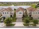 A beautiful home next to a lake with a fountain in a scenic neighborhood at 1097 Trappers Trail Loop, Davenport, FL 33896