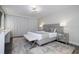 Main bedroom featuring a soft color palette with grey accents, nightstands and luxury carpet at 1097 Trappers Trail Loop, Davenport, FL 33896