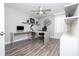 Bright office space boasts a modern desk, contemporary decor, and laminate flooring at 1097 Trappers Trail Loop, Davenport, FL 33896