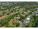 Aerial view highlighting property’s location near a golf course, surrounding landscape, and neighborhood at 1111 Pinar Dr, Orlando, FL 32825