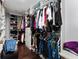 Organized walk-in closet with custom shelving and ample storage space at 1111 Pinar Dr, Orlando, FL 32825