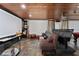 Home theater room with theater seating, projector, and media center at 1111 Pinar Dr, Orlando, FL 32825