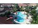 Community pool features a large lounging deck for fun in the sun at 12016 Villanova Dr # 102, Orlando, FL 32837