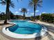 The community pool features a large lounging deck for fun in the sun at 12016 Villanova Dr # 102, Orlando, FL 32837